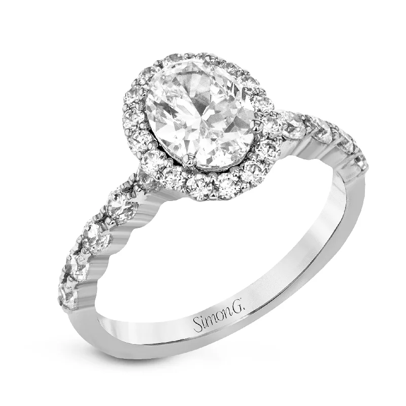 women’s diamond engagement rings with intricate settings-Oval-Cut Halo Engagement Ring In 18k Gold With Diamonds