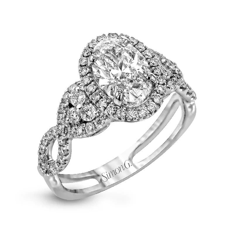 platinum engagement rings with vintage-inspired designs-Oval-Cut Halo Engagement Ring In 18k Gold With Diamonds