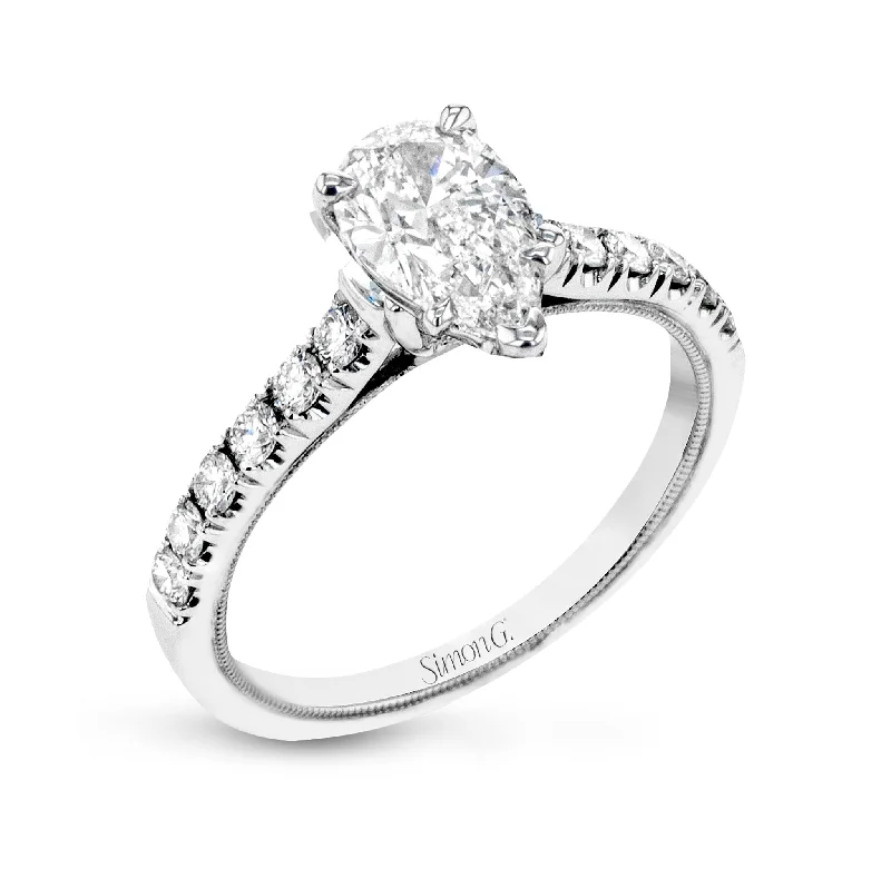 women’s wedding rings with intricate diamond settings-Pear-Cut Engagement Ring In 18k Gold With Diamonds